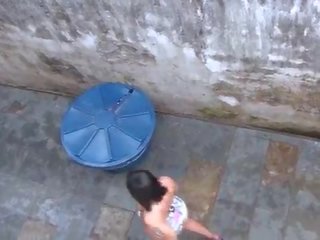 Espiando একটি vizinha rabuda na favela e batendo uma