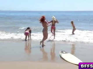 Lascivious teens flirting with the pretty life guard end up sucking his putz